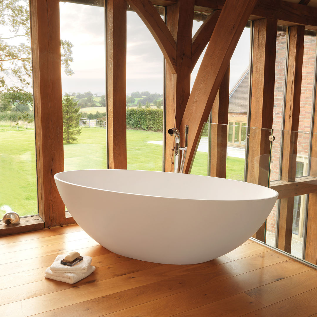 Ellipse Stone Bath homify Modern bathroom Bathtubs & showers