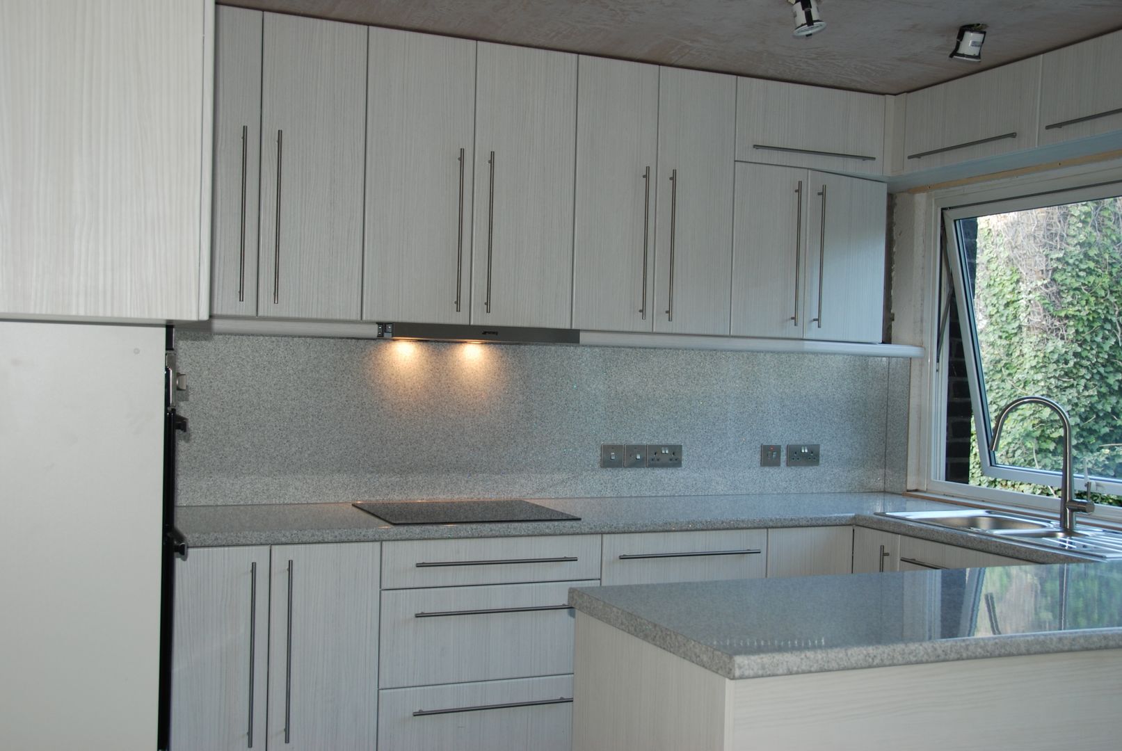 Cooking area after renovation The Kitchen Makeover Shop Ltd