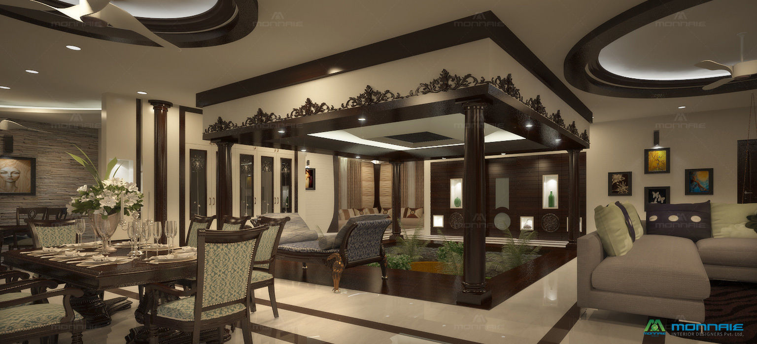 Nalukettu- Living area Monnaie Interiors Pvt Ltd 客廳