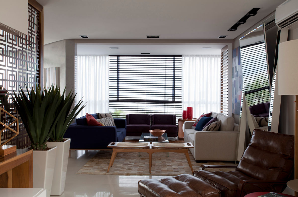 Apartamento Bossa, Juliana Pippi Arquitetura & Design Juliana Pippi Arquitetura & Design ห้องนั่งเล่น