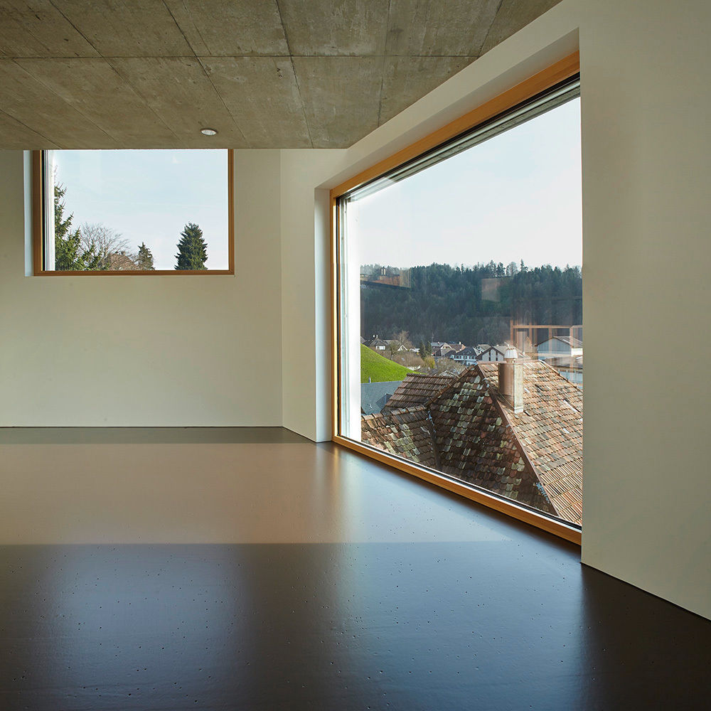 Haus Sumiswald, Translocal Architecture Translocal Architecture Salones minimalistas