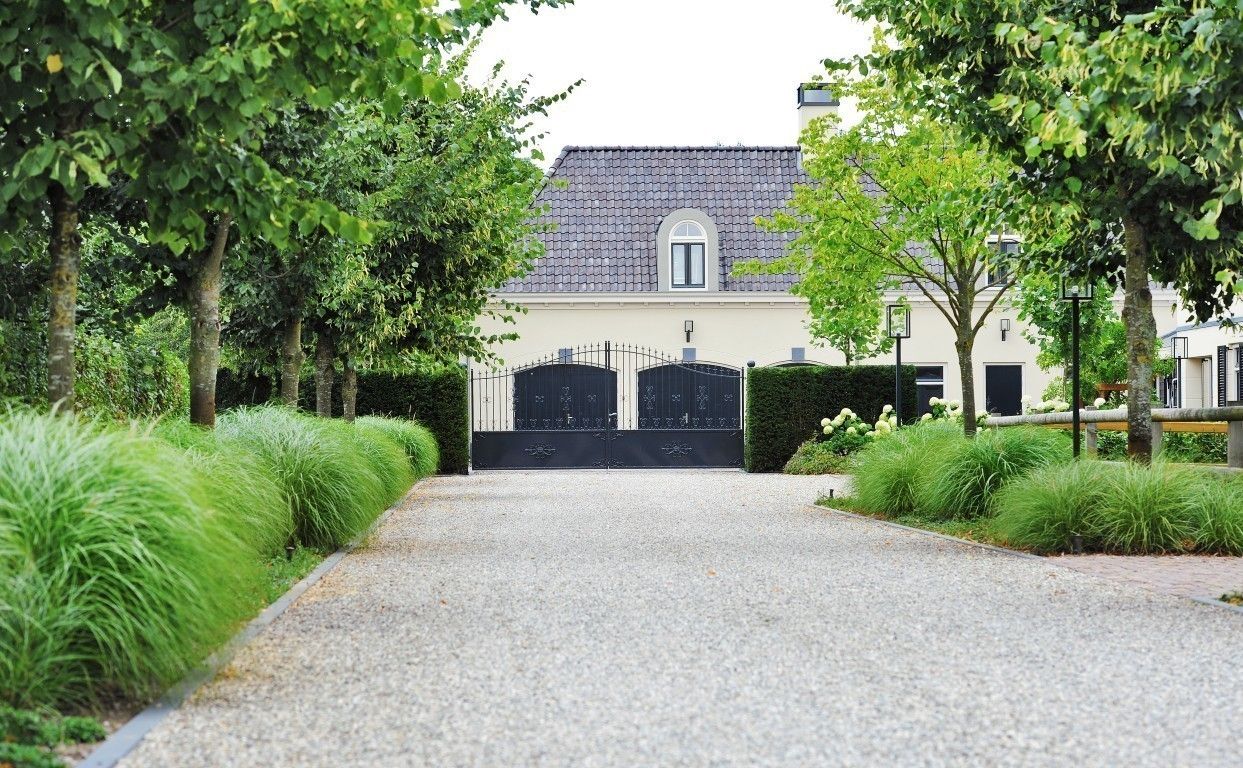 Prairietuin voor spelende kinderen en hobby vee, Hendriks Hoveniers Hendriks Hoveniers Country style garden