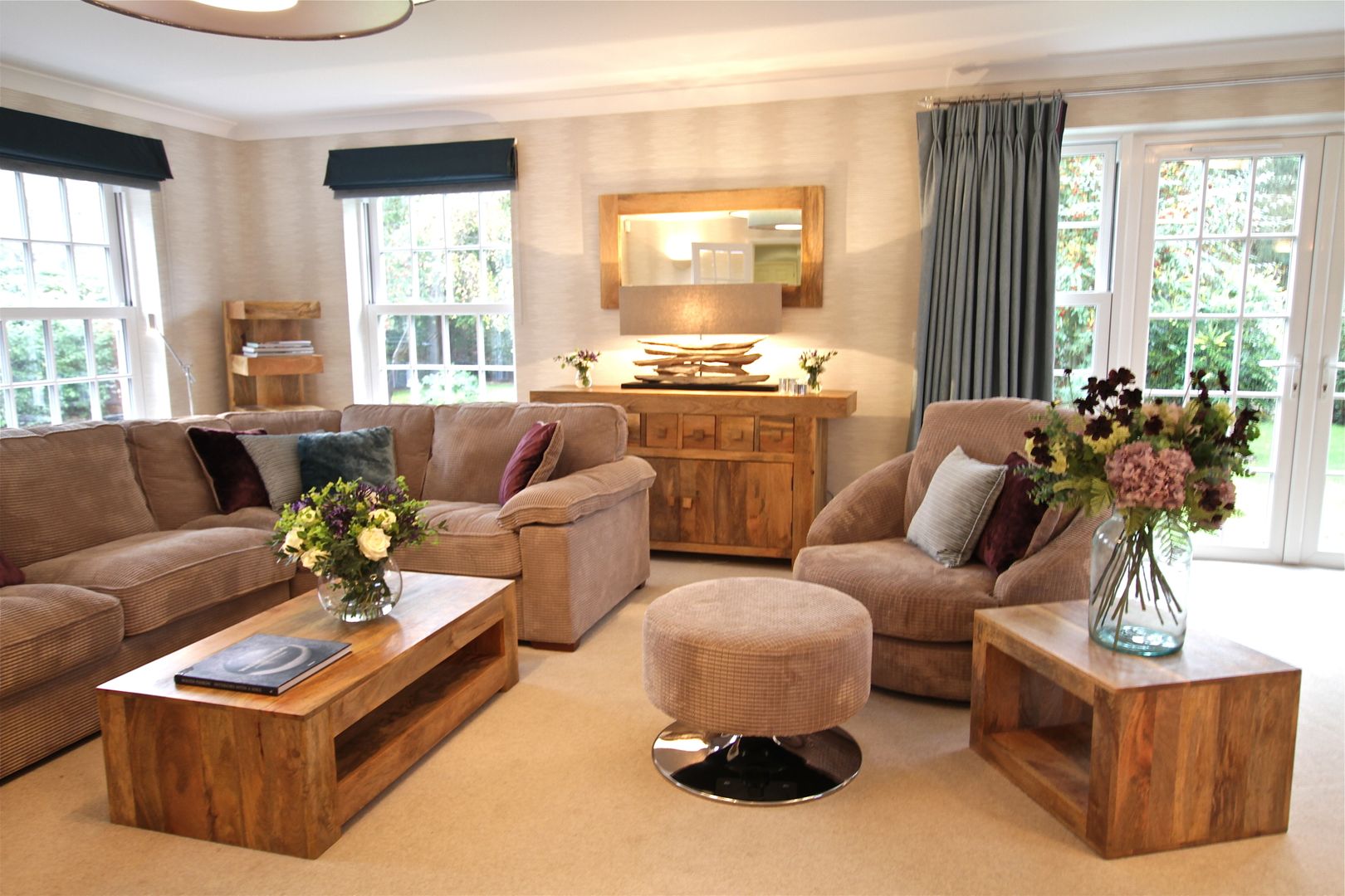 Warm, Chunky Wooden Furniture, Calm Soft Furnishings in Neutral and Blues Design by Deborah Ltd Modern living room