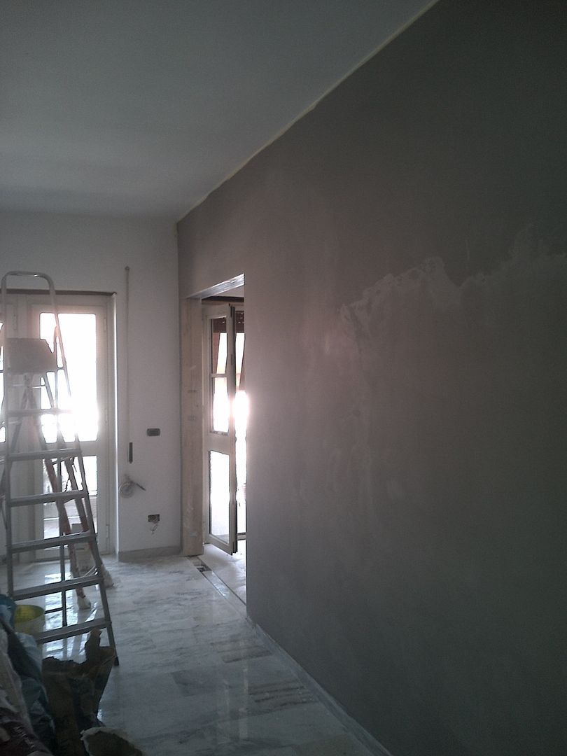 Progetto di interni per un appartamento di una giovane coppia - Roma, Via Val di Non , Roberta Rose Roberta Rose Minimalist walls & floors Paint & finishes