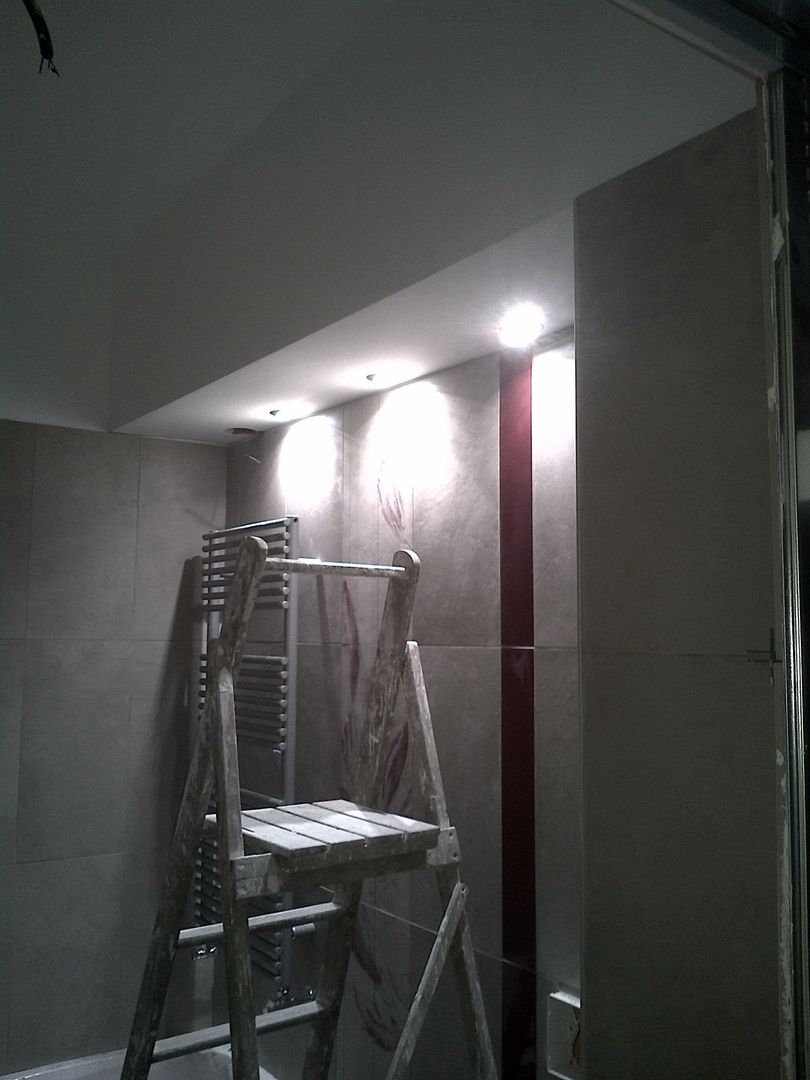 Progetto di interni per un appartamento di una giovane coppia - Roma, Via Val di Non , Roberta Rose Roberta Rose Bathroom Lighting