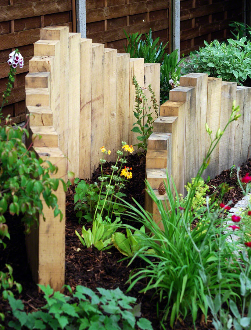 Sculptural inverted oak sleepers Lush Garden Design Taman Gaya Asia