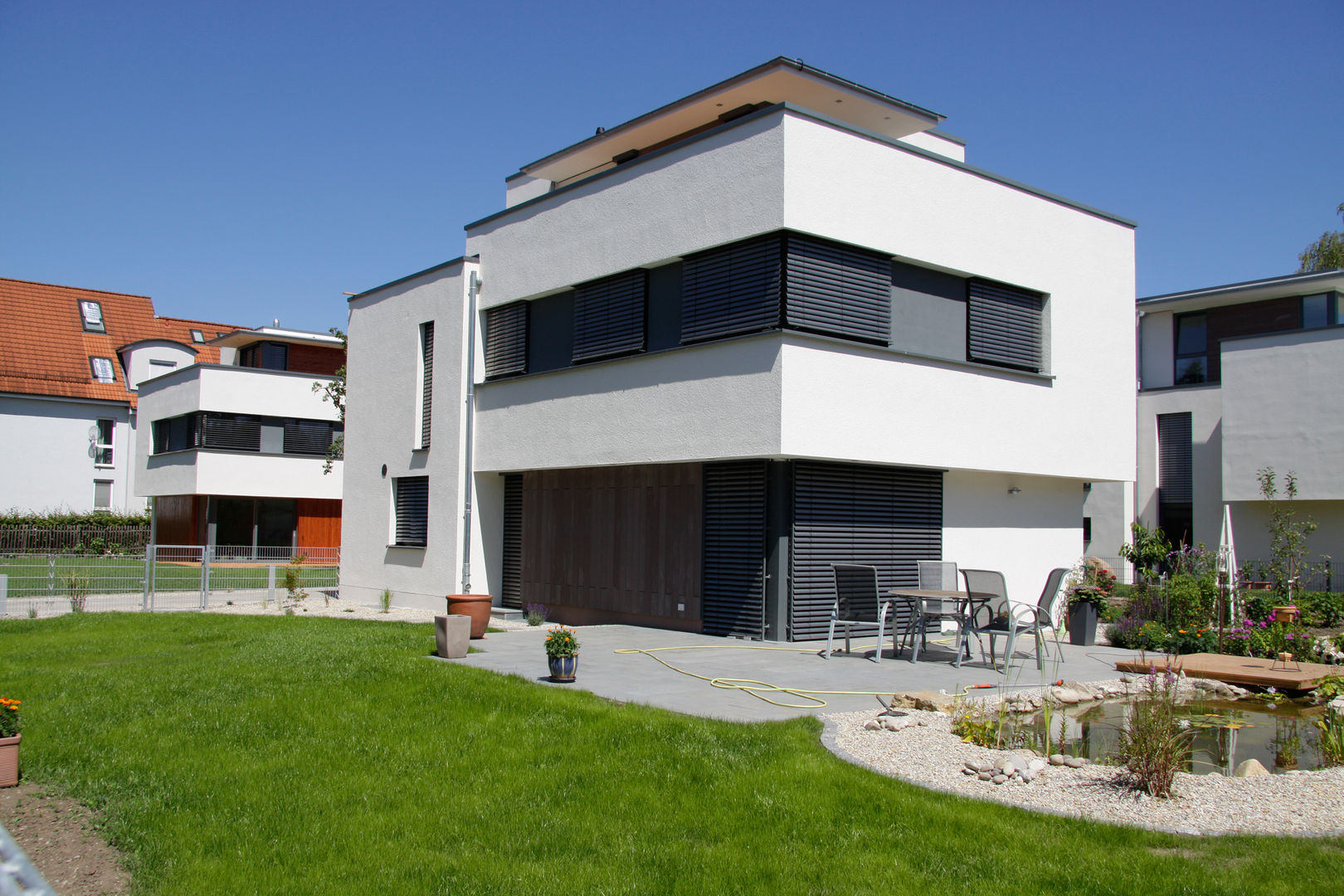 Ensemble von drei Einfamilienhäusern, Scholz&Fuchs Architekten Scholz&Fuchs Architekten Modern houses