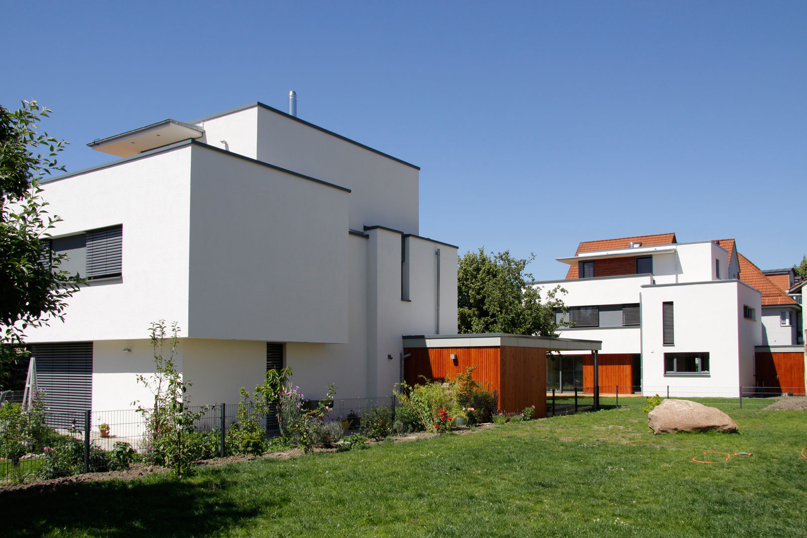 Ensemble von drei Einfamilienhäusern, Scholz&Fuchs Architekten Scholz&Fuchs Architekten Modern houses