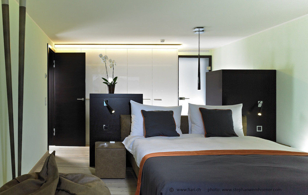 Privat Residenz "Les Dents du Midi", Innenarchitektur und Design Dalpiaz Innenarchitektur und Design Dalpiaz Modern style bedroom
