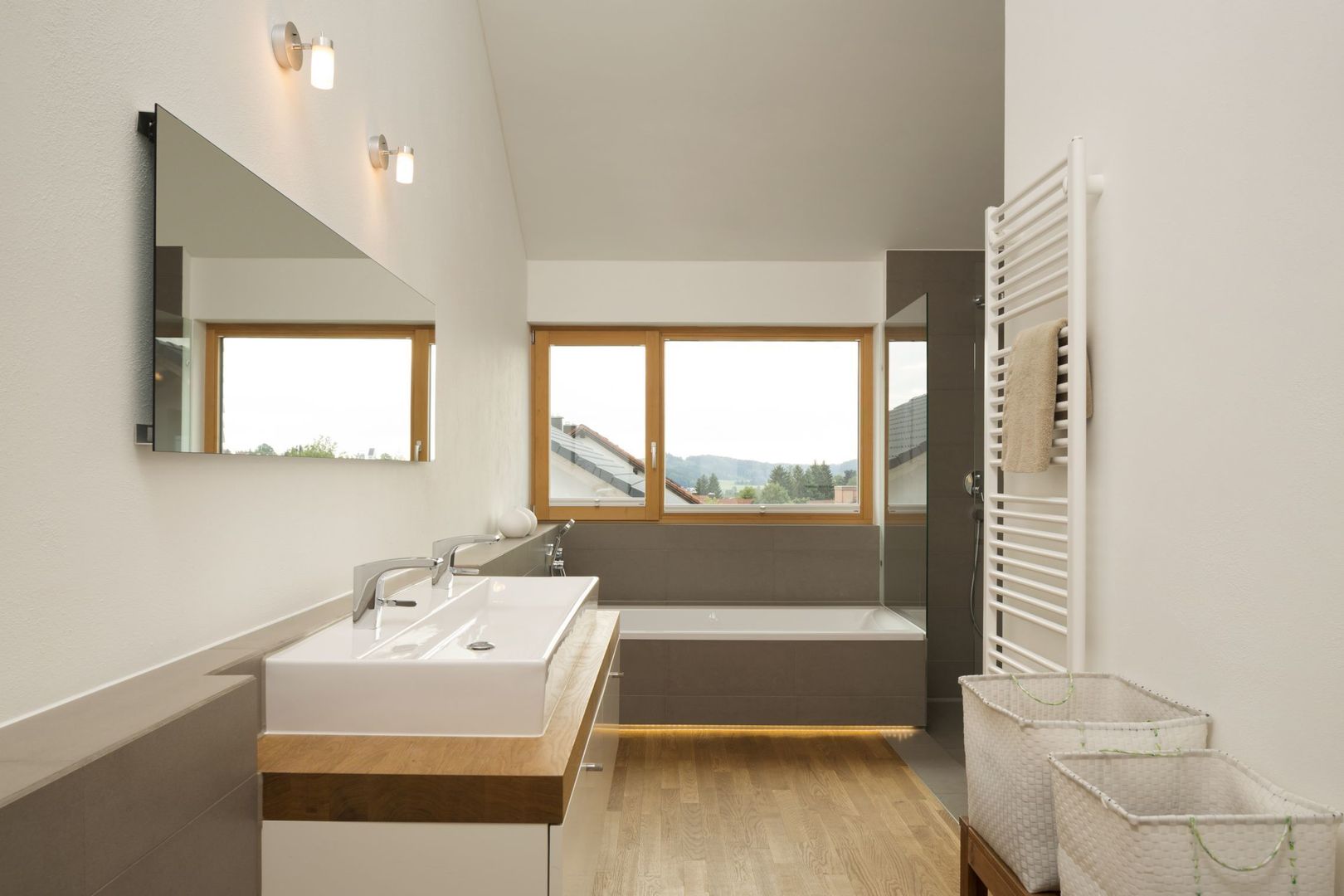 Haus Brunner, architektur + raum architektur + raum Casas de banho modernas