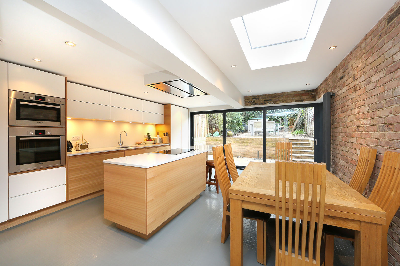 ​kitchen extension dulwich with flat roof and open brickwork homify Modern kitchen