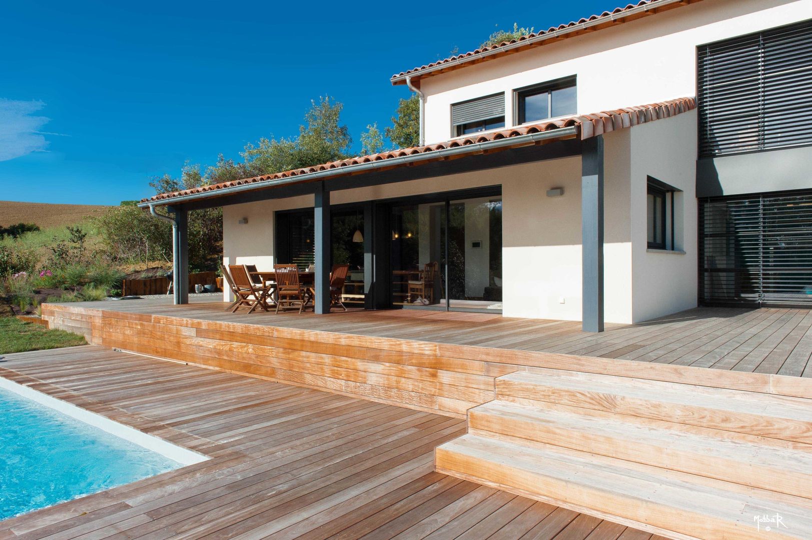 Maison individuelle BBC à Péchabou, POUGET Agnès POUGET Agnès Balcones y terrazas modernos