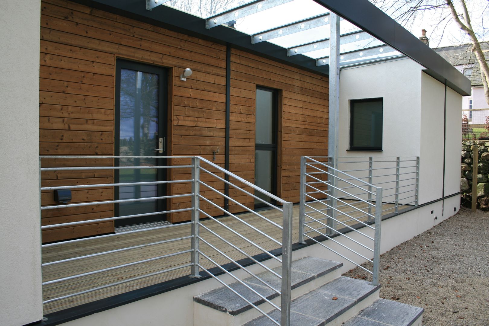 Schoolmasters rear deck build different Modern home