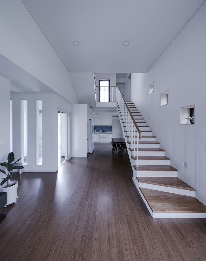 homify Minimalist corridor, hallway & stairs