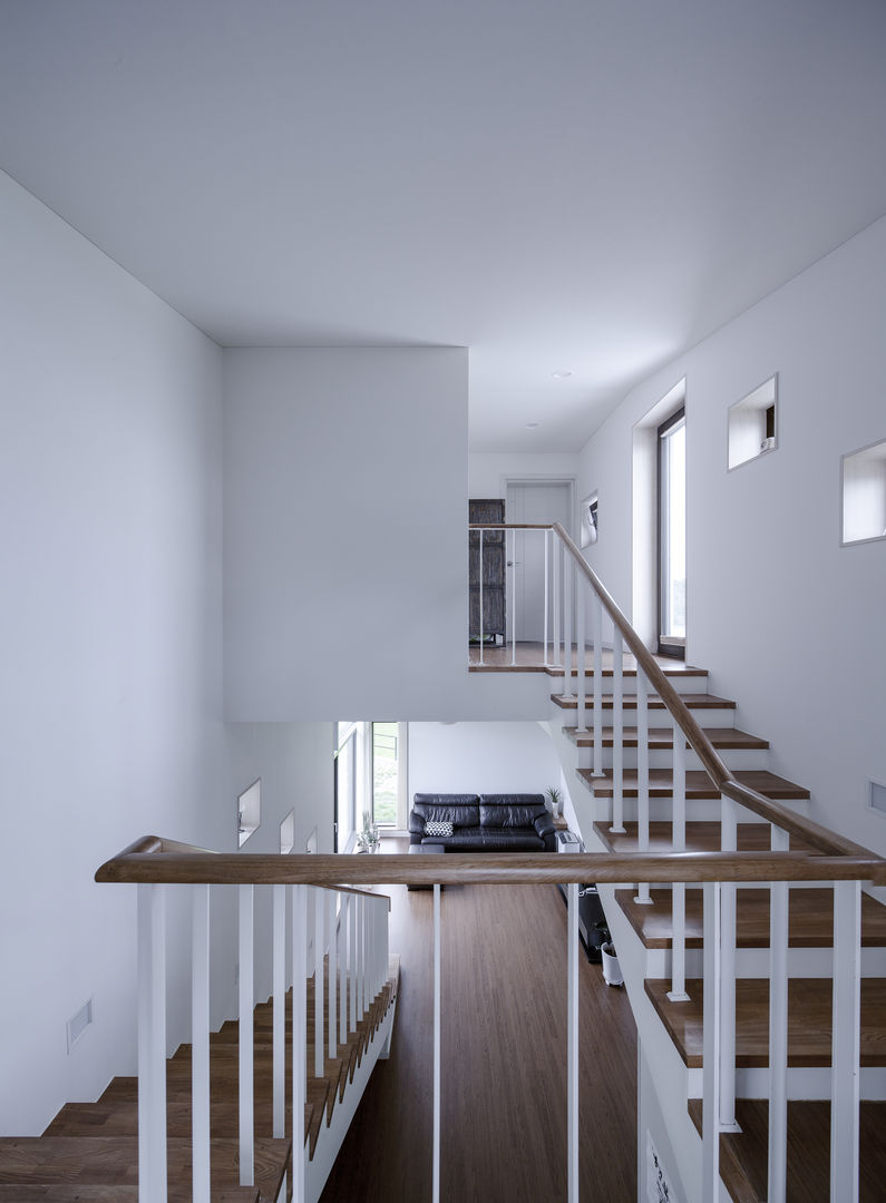 homify Pasillos, vestíbulos y escaleras minimalistas