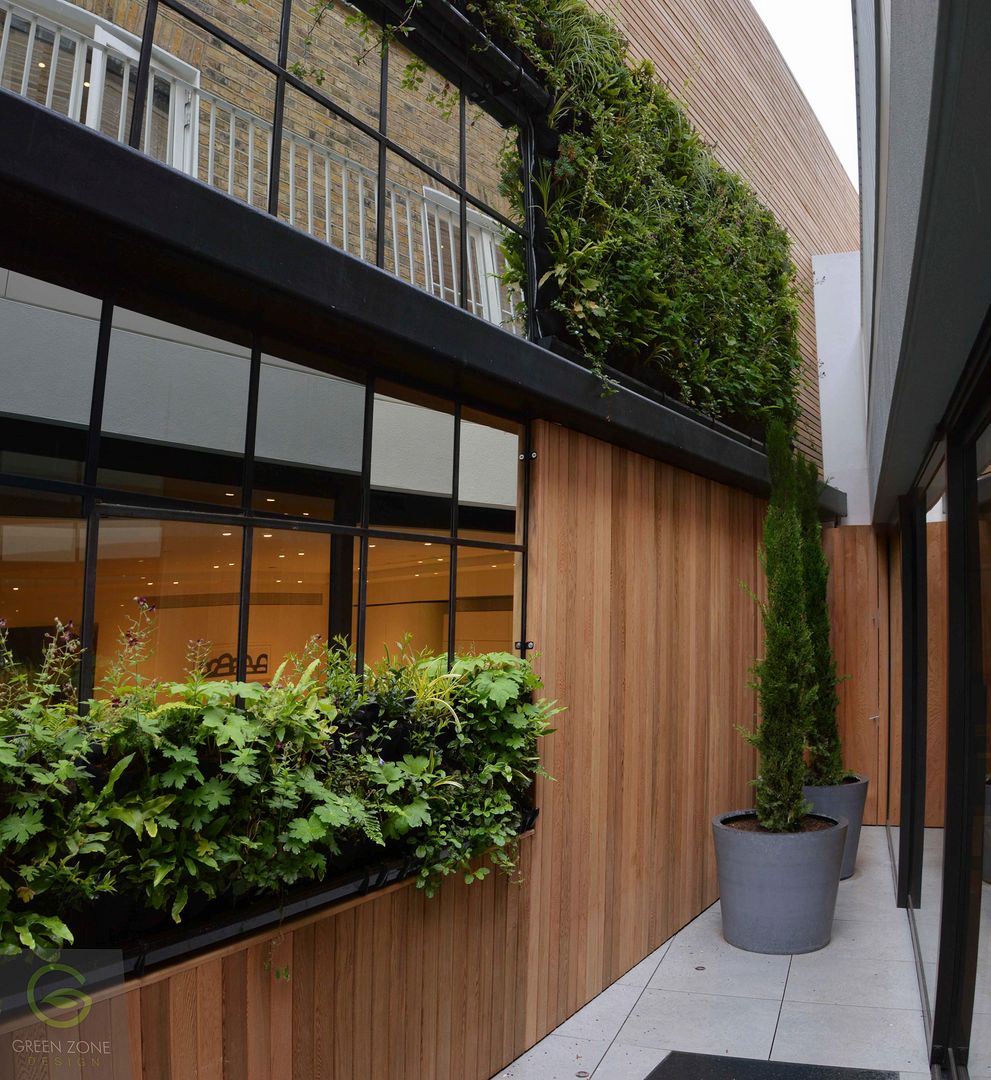Living wall with mirrors green zone design ltd Modern garden