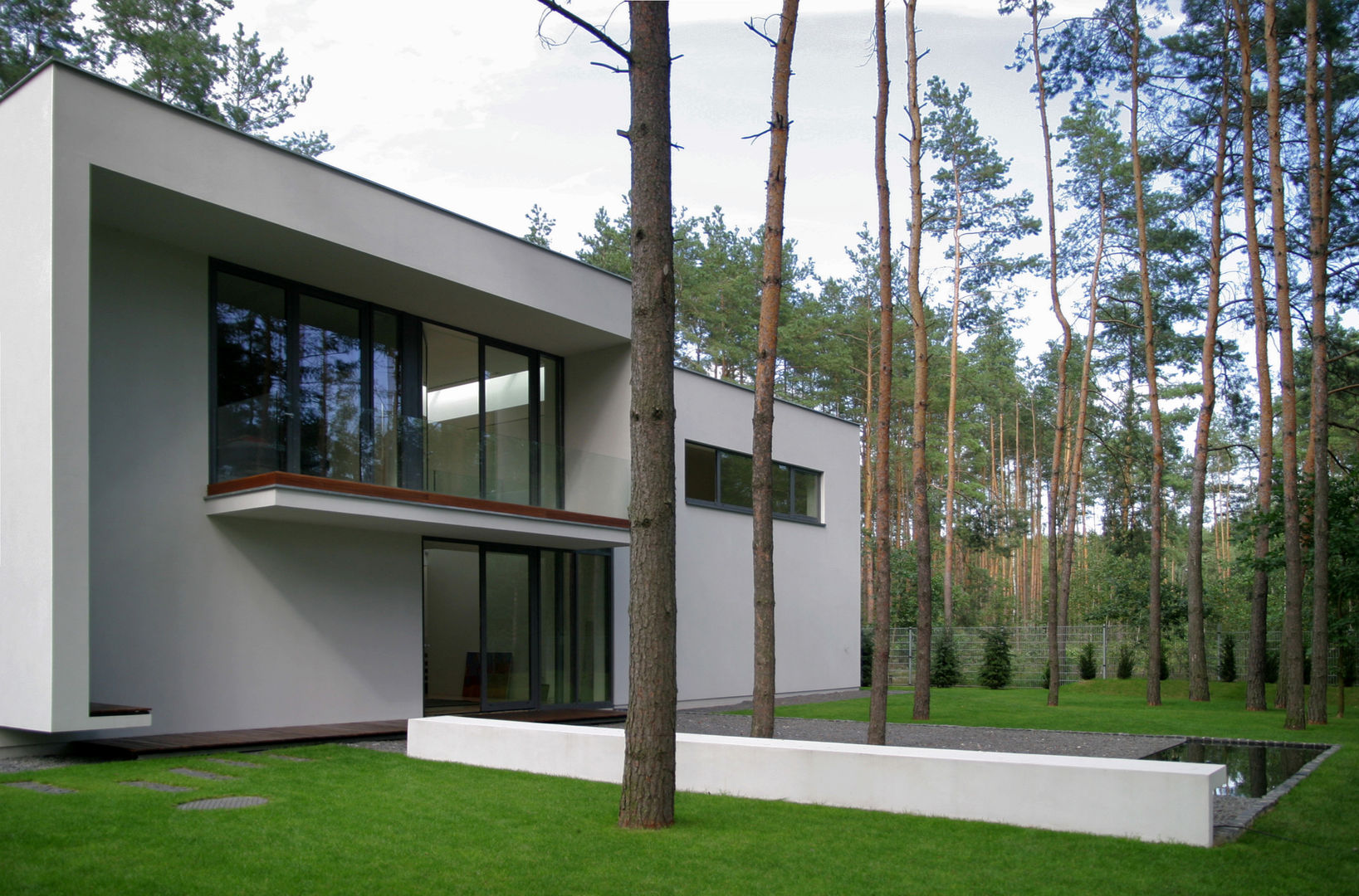Dom B w Warszawie, Ingarden & Ewý Architekci Ingarden & Ewý Architekci Modern home