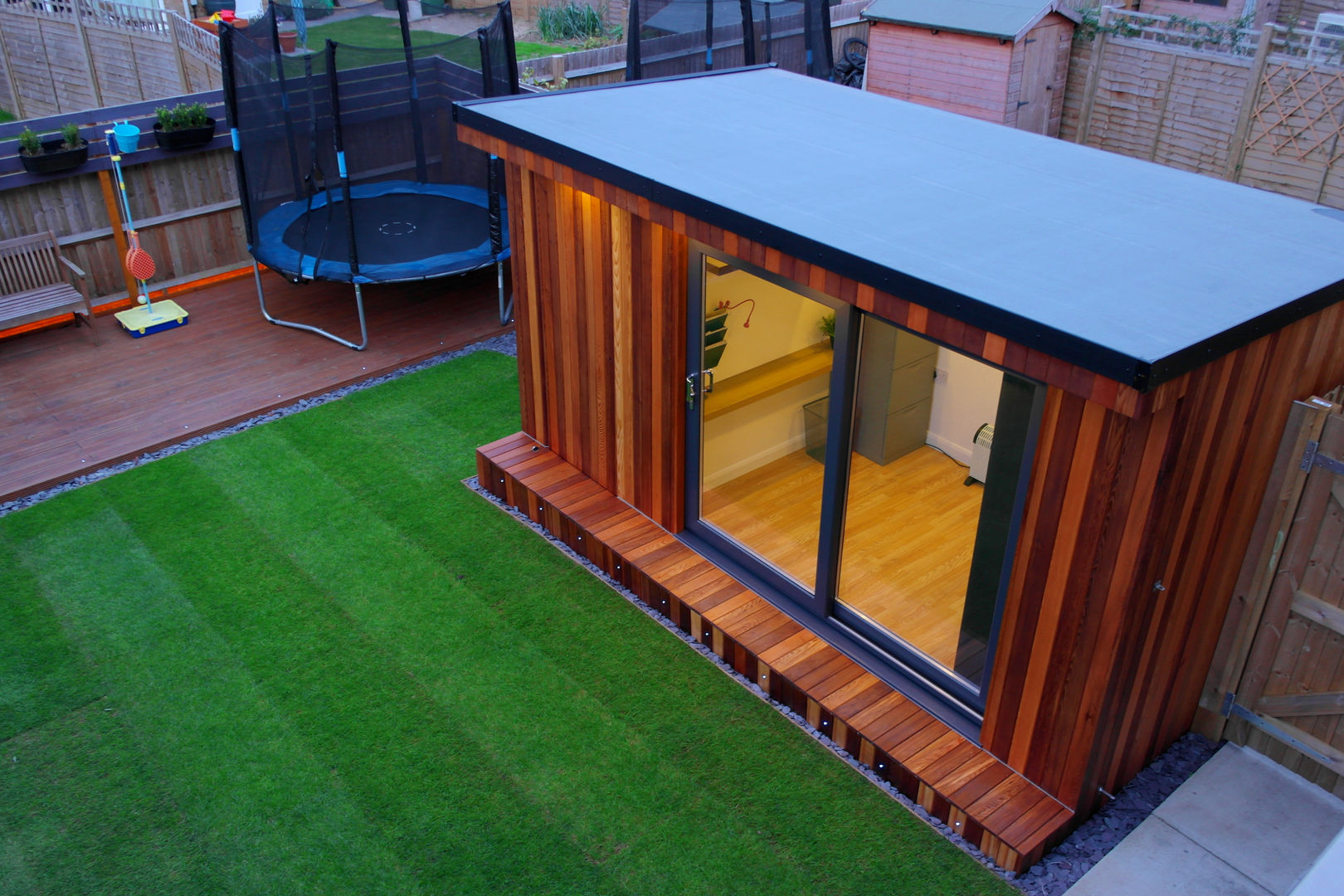 Garden Office with hidden storage shed built by Garden Fortress , Surrey homify Modern study/office