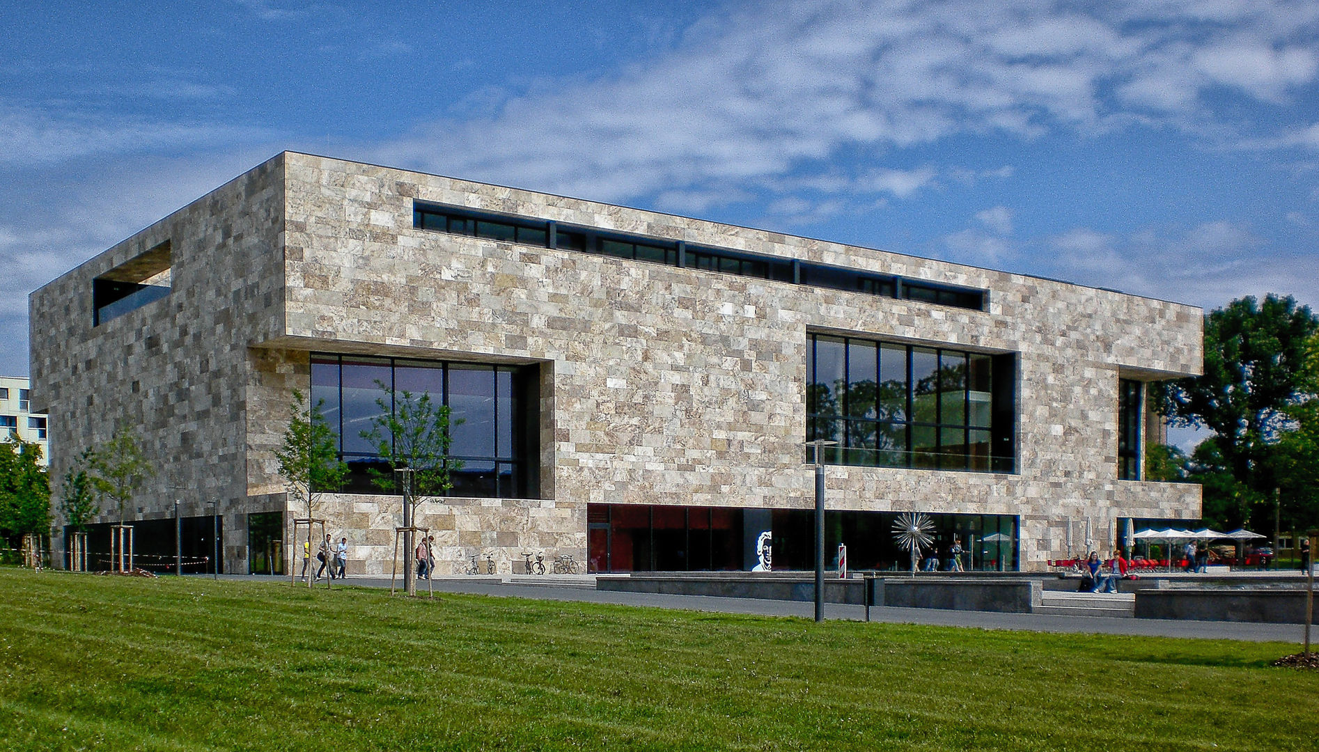Facciata ventilata in travertino Università di Francoforte, Pietre di Rapolano Pietre di Rapolano Ruang Komersial Batu Sekolah
