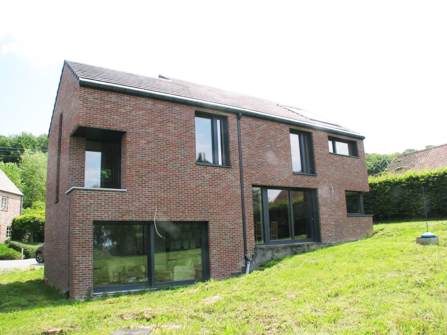 Maison passive en Hainaut, dune Architecture sprl dune Architecture sprl Casas de estilo moderno