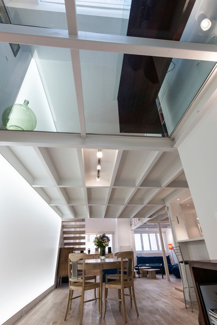 Un loft plus lumineux, Fables de murs Fables de murs Modern dining room