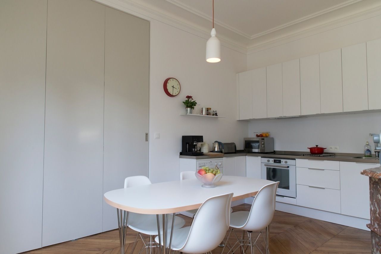 Appartement Martel, Paris 10e, Ramsés Salazar Architecte Ramsés Salazar Architecte غرفة السفرة