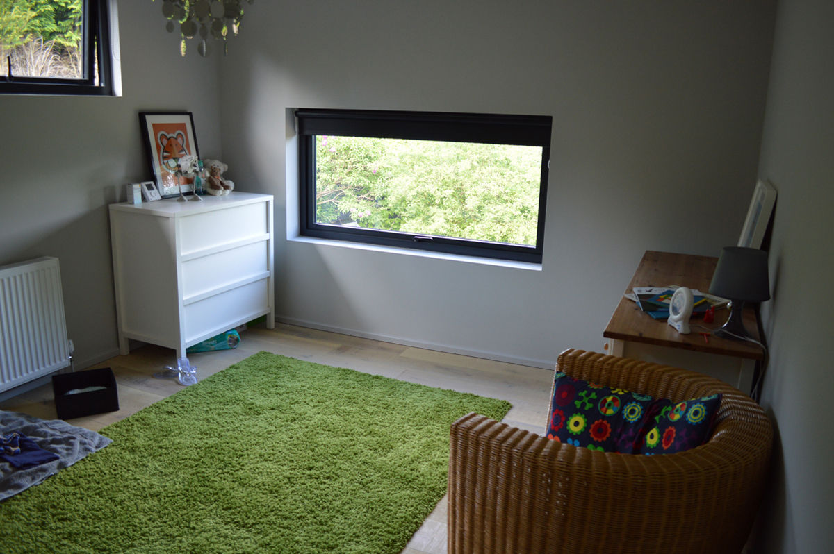 Nursery Room with Feature Window in Renovated 1960s Property ArchitectureLIVE Modern style bedroom nursery,timber flooring,underfloor heating,feature window,green rug