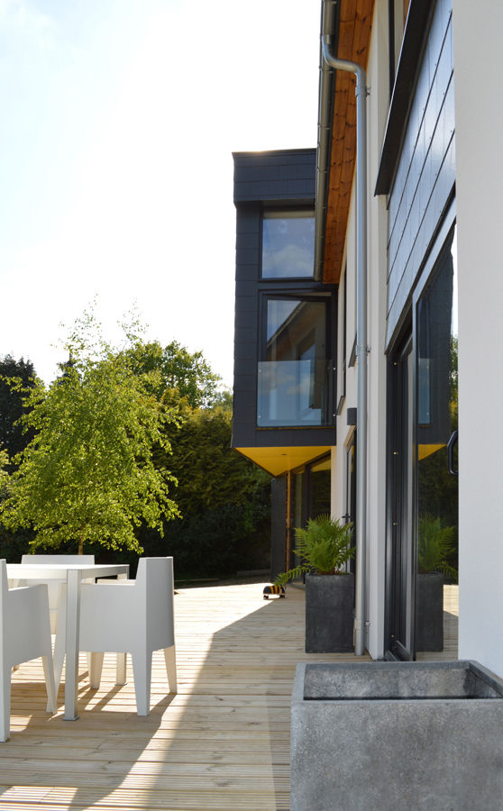 Cantilevered First Floor Extension & Terrace ArchitectureLIVE Modern houses master bedrrom,cantilever,extension,full height glazing,terrace,decking,yellow,1960s house