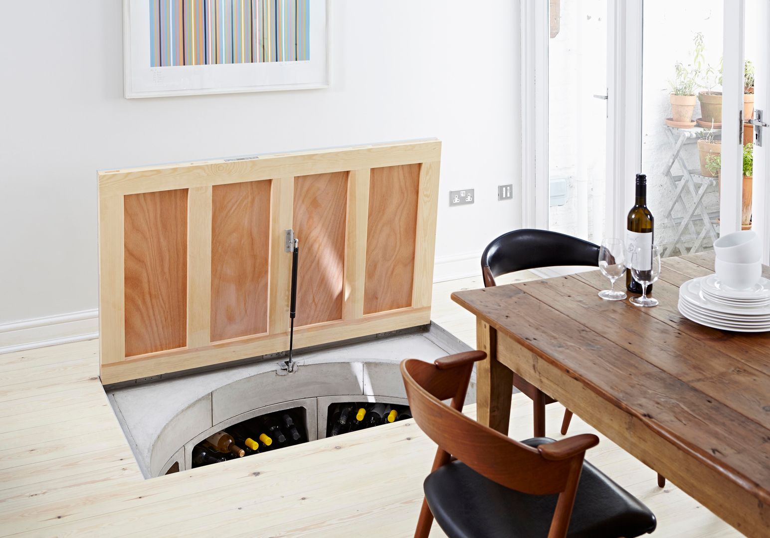 Original Spiral Cellar with Recessed Trap Door for Timber Spiral Cellars Bodegas modernas