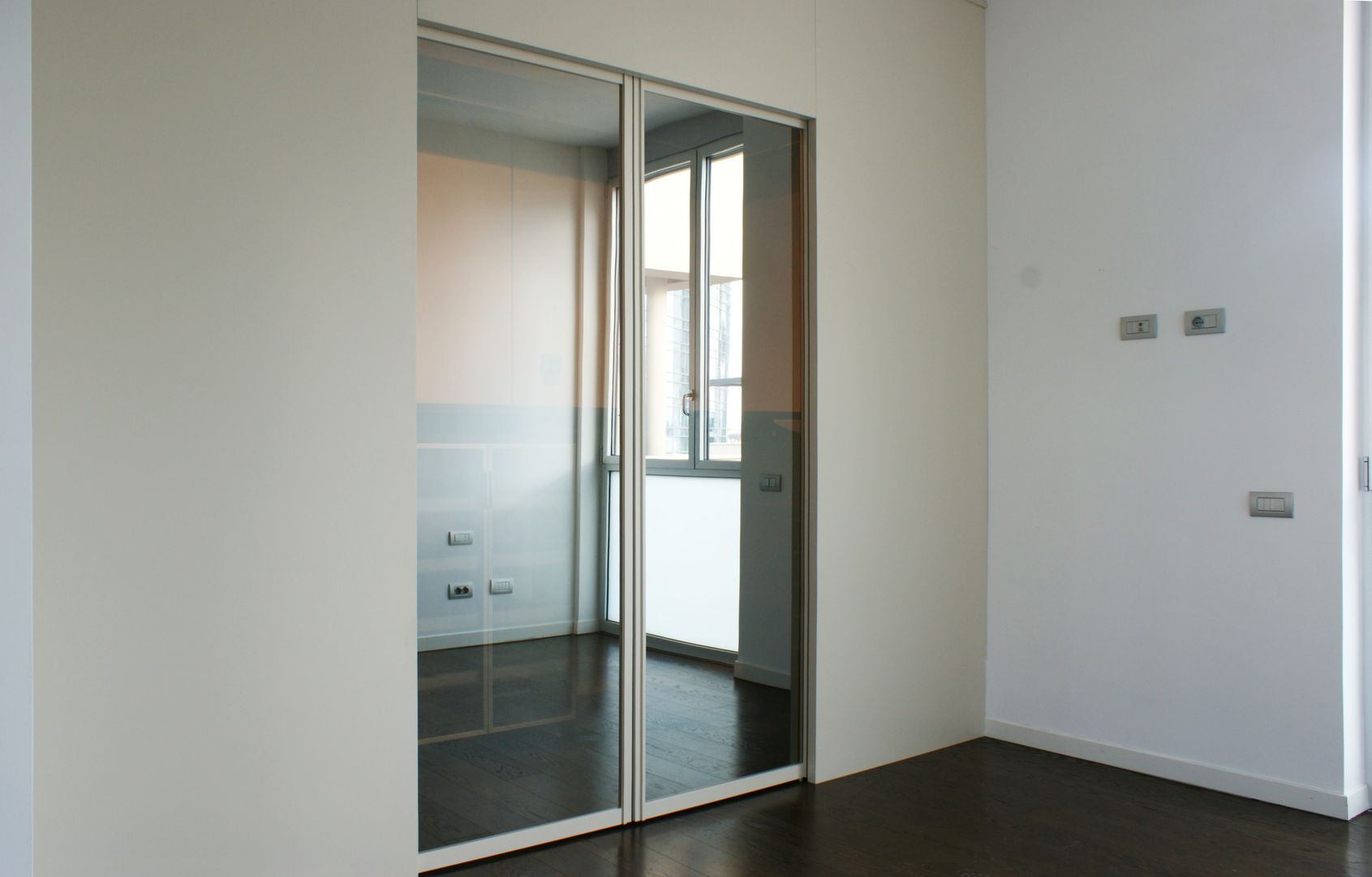 Appartamento a Milano, Gaia Brunello | in-photo Gaia Brunello | in-photo غرفة نوم خزانة الملابس