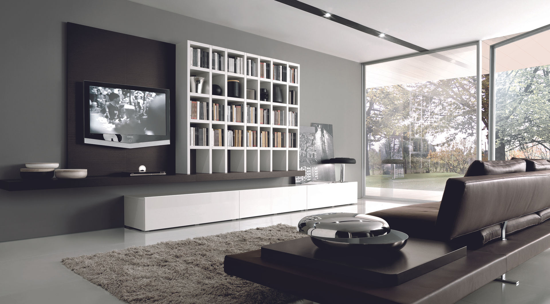 Wall hung TV unit and bookcase. Also with hidden floor storage. Lamco Design LTD 现代客厅設計點子、靈感 & 圖片 電視櫃