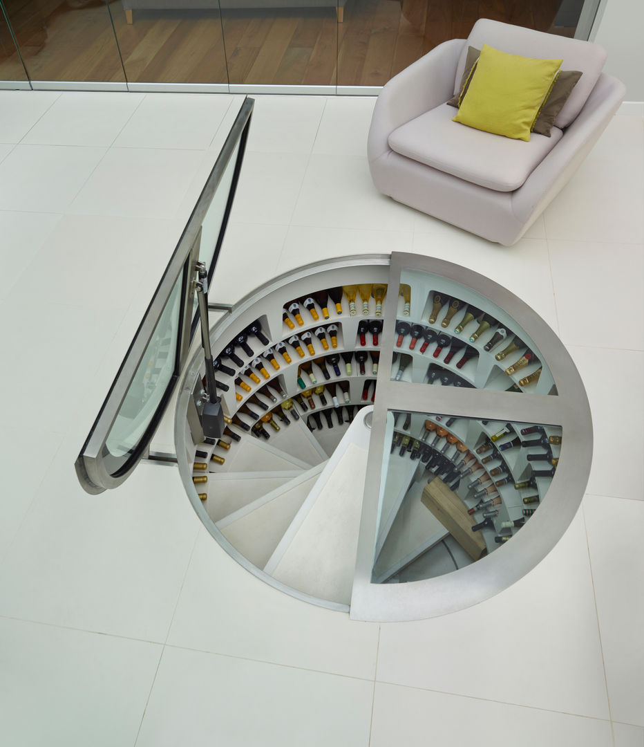 Round Hinged Trap Door and White Spiral Cellar homify Bodegas de vino modernas: Ideas, imágenes y decoración Bodegas