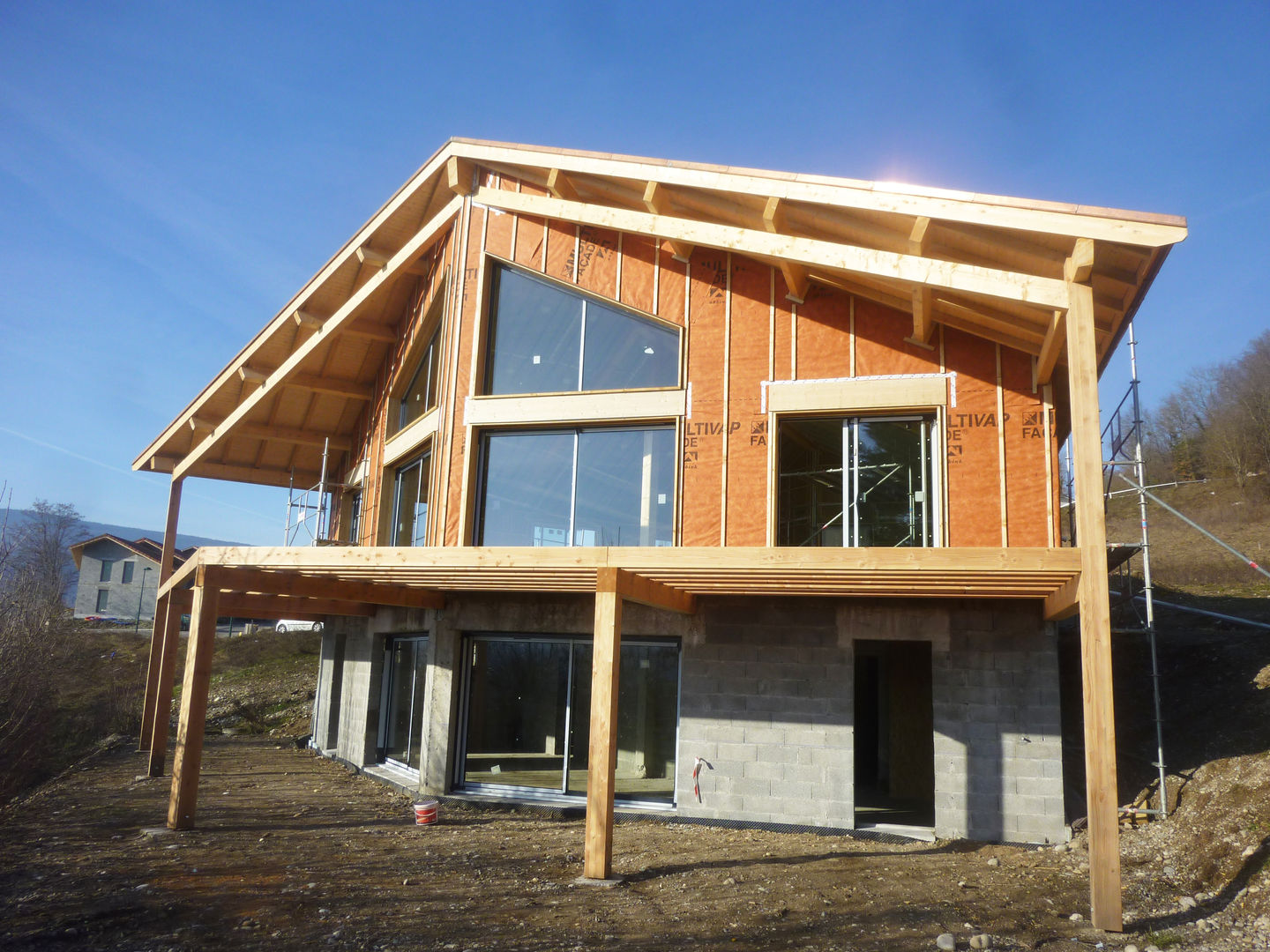 Maison BBC à Bellegarde-Sur-Valserine 01200, Philippe GUILLOUX - BYG Architecte Philippe GUILLOUX - BYG Architecte Casas de estilo ecléctico