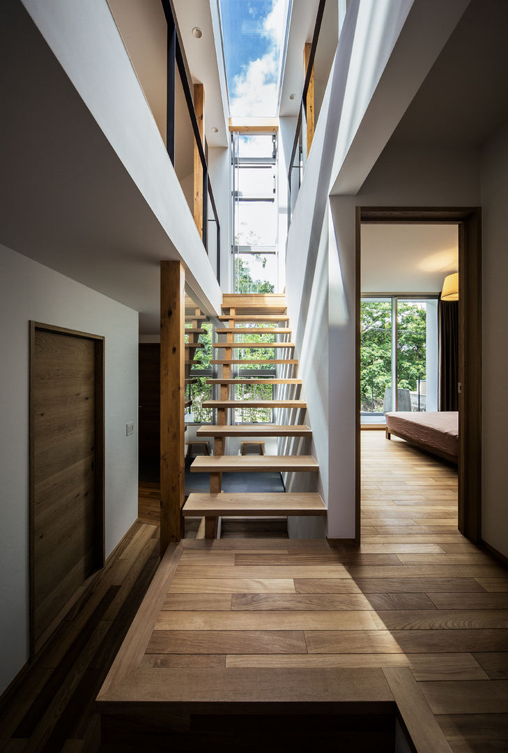 クレバスハウス クレバスをイメージした階段ホール 株式会社seki.design モダンスタイルの 玄関&廊下&階段