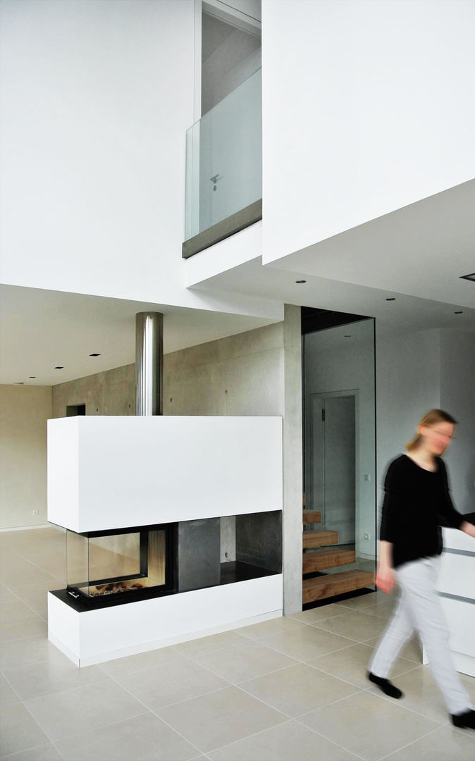 Haus MD, unlimited architekten | neumann + rodriguez unlimited architekten | neumann + rodriguez Salas de estilo moderno