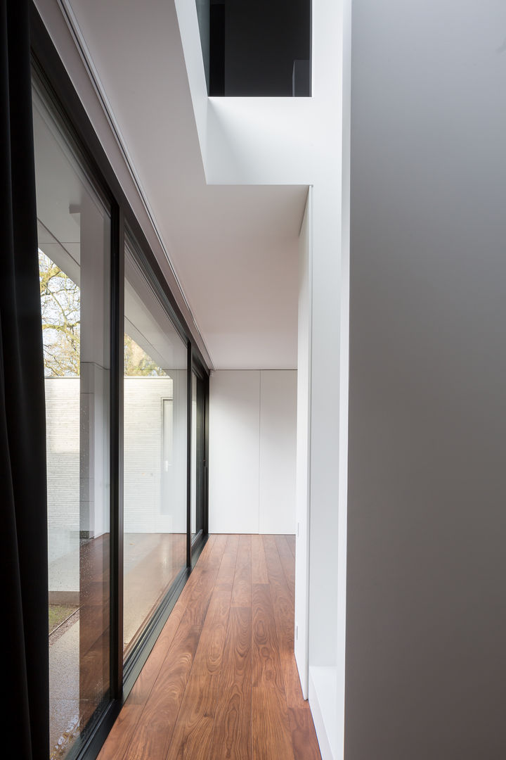 homify Minimalist corridor, hallway & stairs