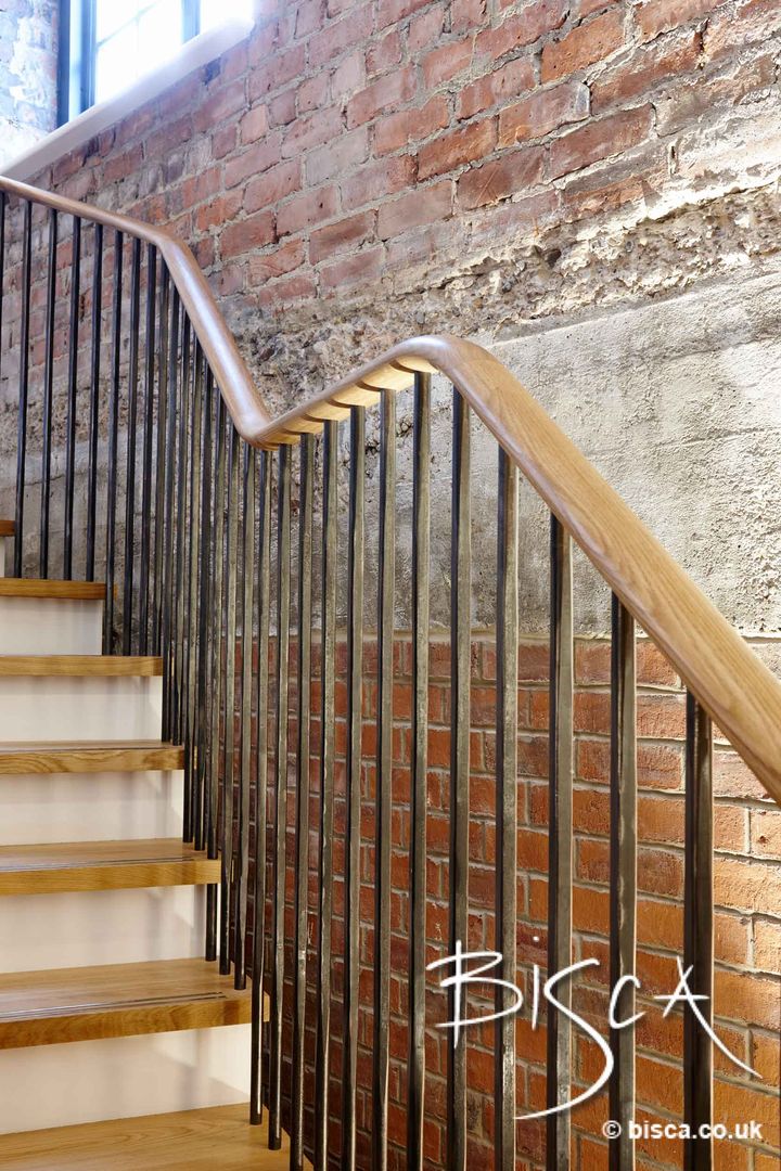 Exposed brickwork in old industrial building Bisca Staircases industrial style corridor, hallway & stairs