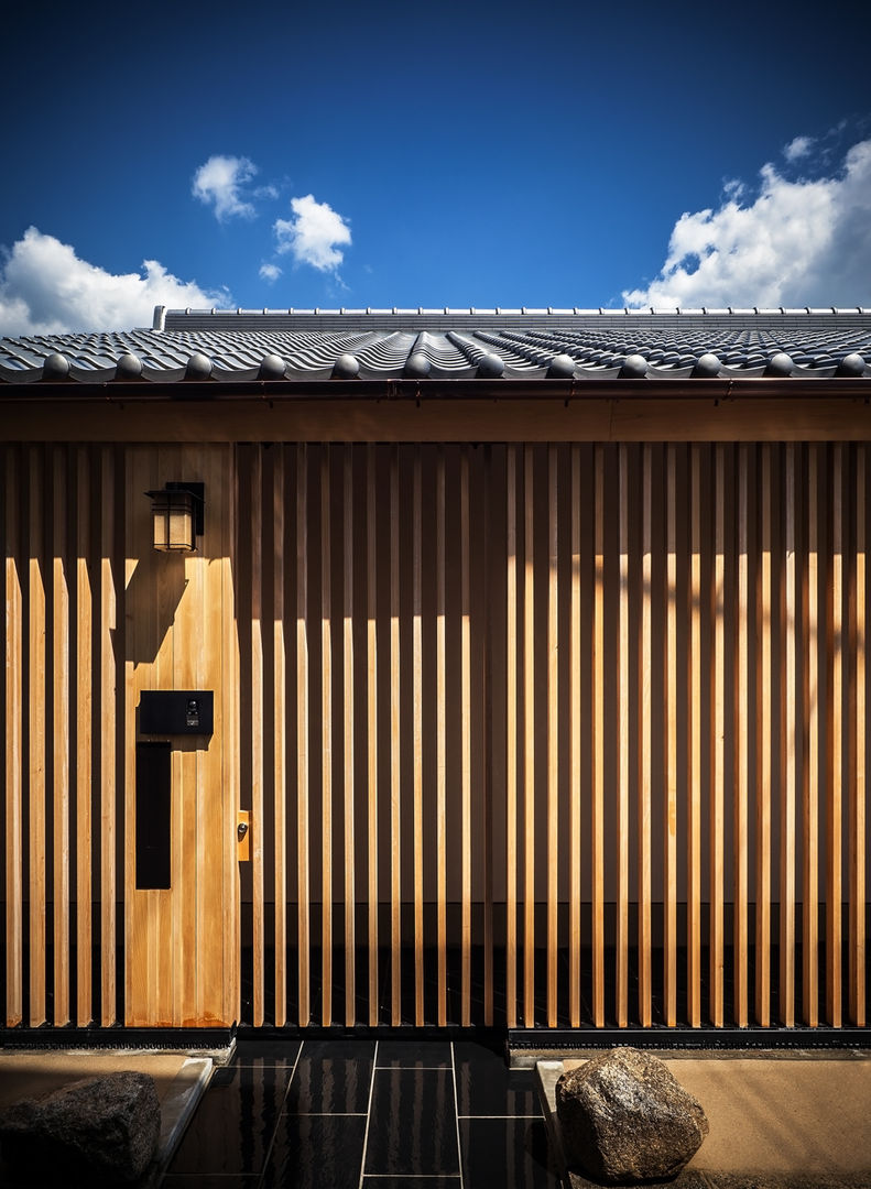 東平野の家 それぞれの庭の家, 株式会社seki.design 株式会社seki.design Casas de estilo asiático