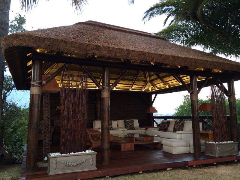 Pérgola de Junco Africano GRUPO ROMERAL Casas de estilo tropical