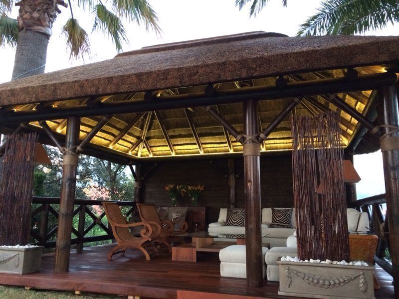 Pérgola de junco africano GRUPO ROMERAL Jardines de estilo tropical Marquesinas, toldos e invernaderos