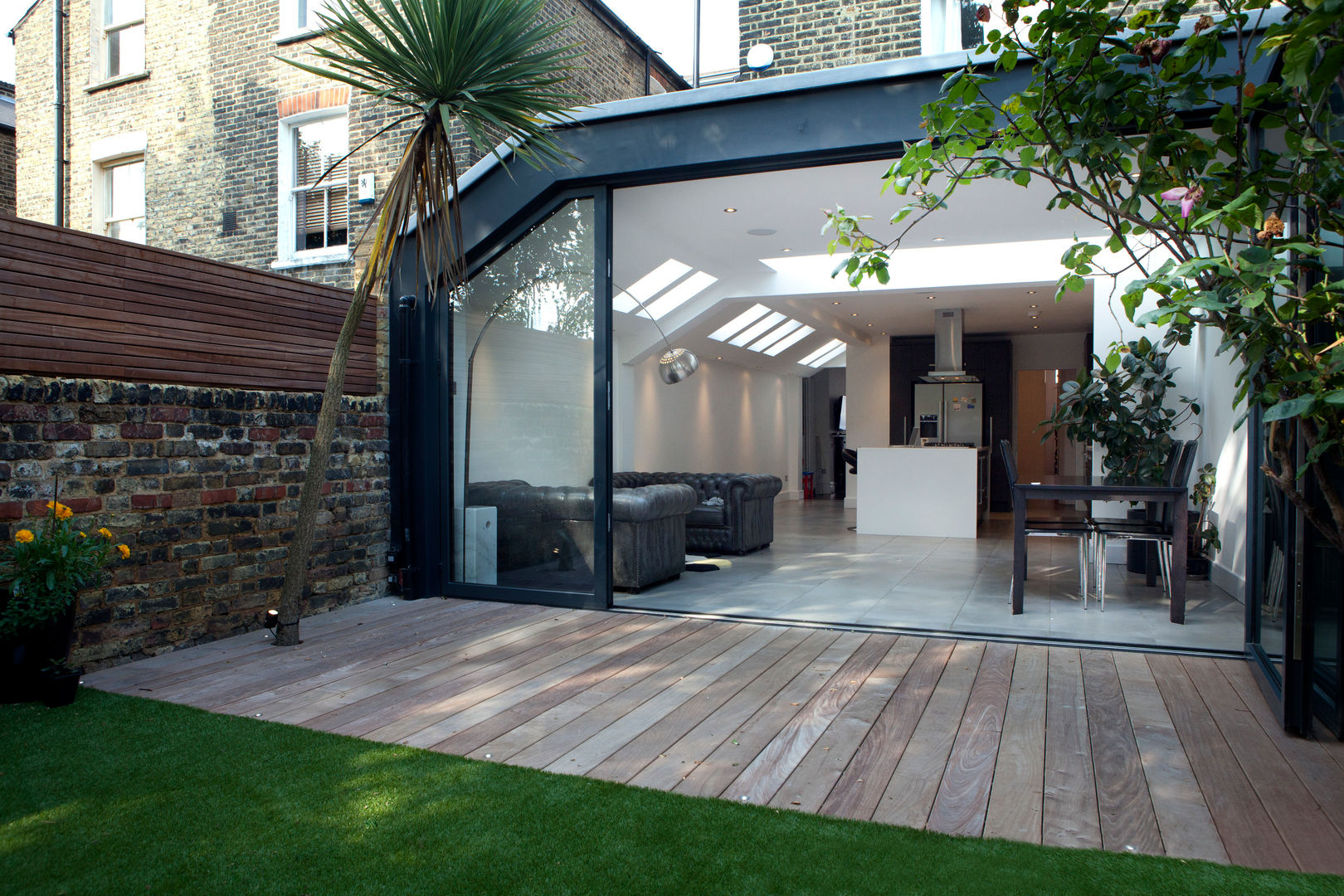 inside/out homify Modern home london,extension,architecture,glass,open plan,kitchen,folding doors