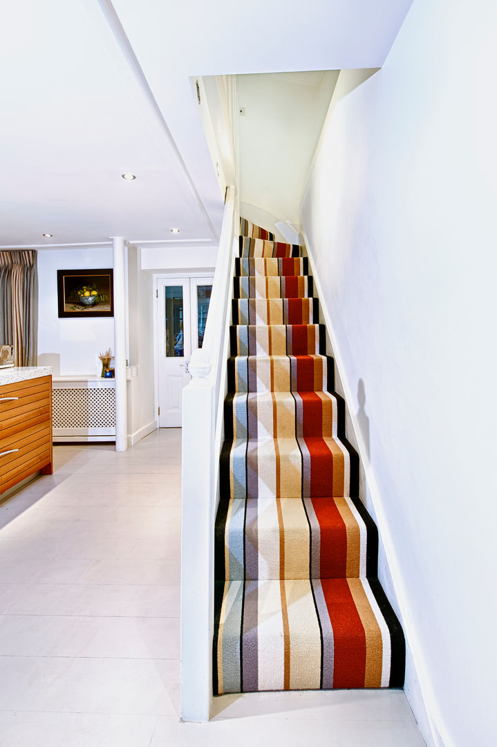 Stunning stripy stairs Warp & Weft (uk) Ltd الممر الحديث، المدخل و الدرج ديكورات واكسسوارات