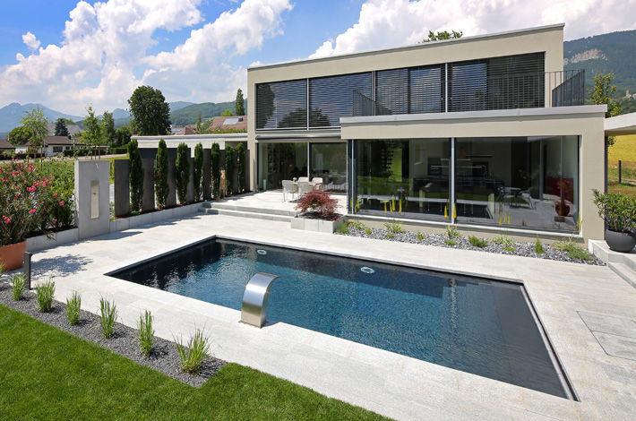 Villa mit Pool, Unica Architektur AG Unica Architektur AG Nowoczesny basen