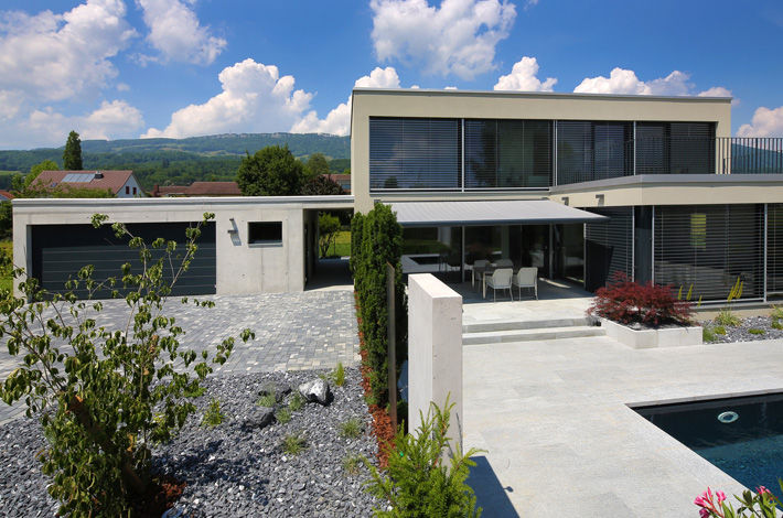 Villa mit Pool, Unica Architektur AG Unica Architektur AG Moderne Häuser