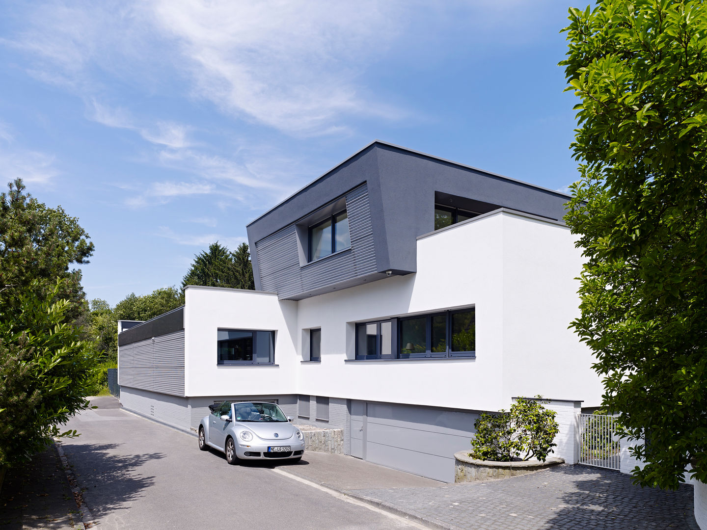 Fassade mit Aufstockung Obergeschoss Gritzmann Architekten