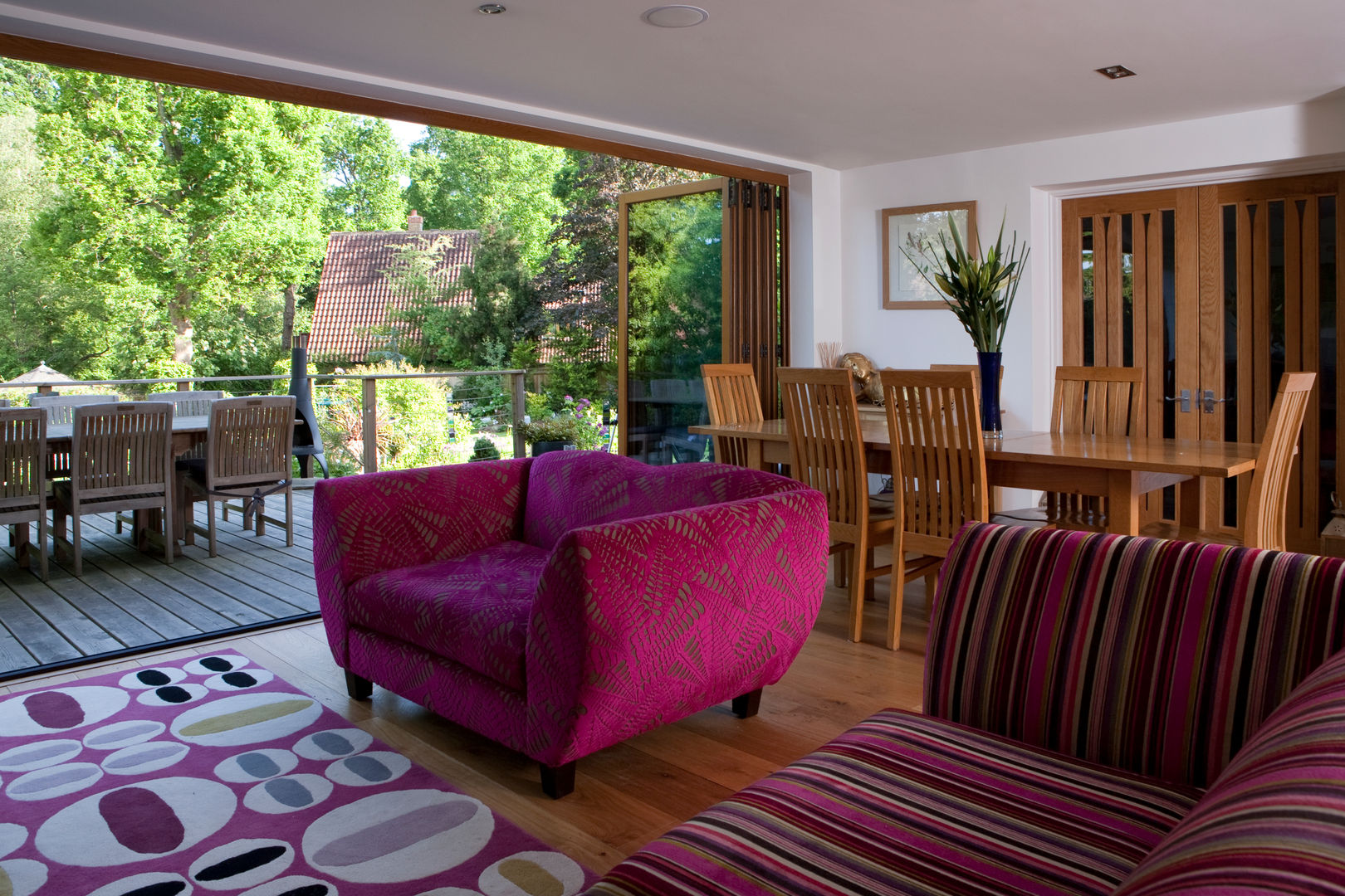 Dining and family room: modern by Dye Tabrett Architects, Modern