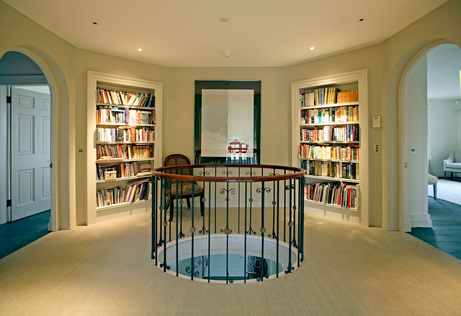 Landing bookcases Giles Jollands Architect Classic style corridor, hallway and stairs