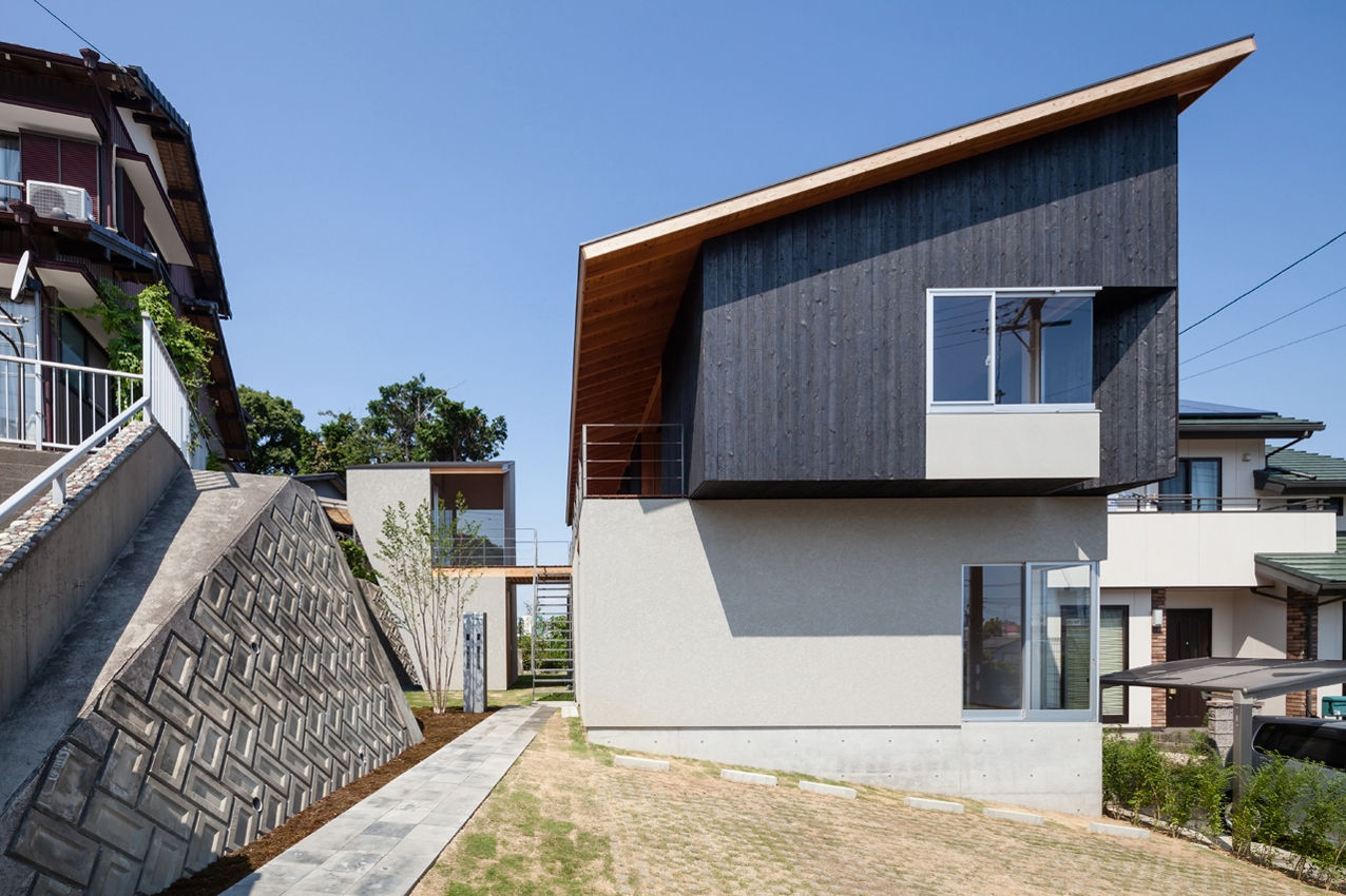 西向きの家, takasago architects takasago architects Maisons modernes
