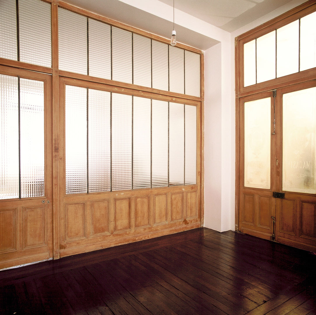 Loft martel, Antonio Virga Architecte Antonio Virga Architecte Industrial style windows & doors