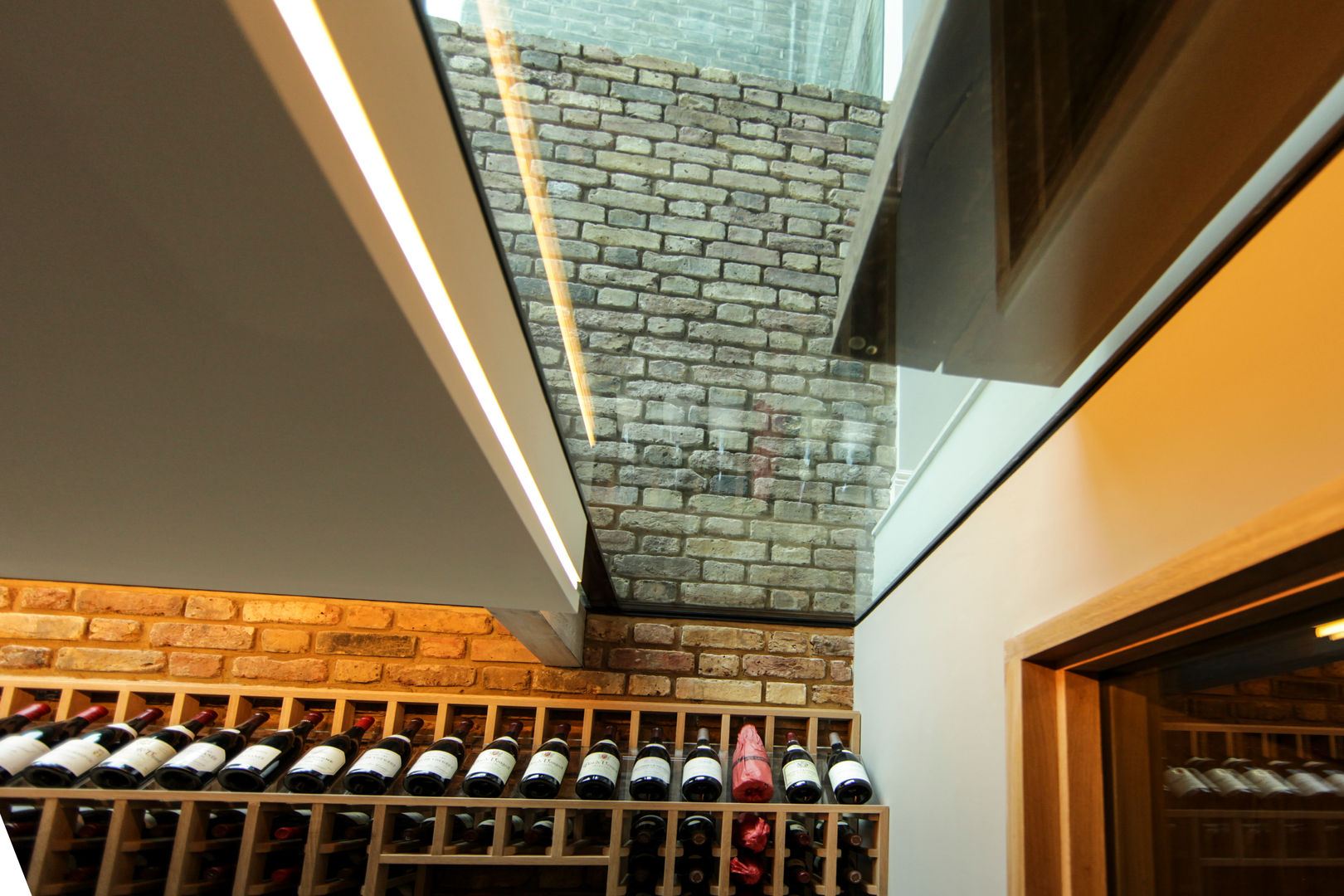 Walk-On Glass Ceiling to Wine Cellar Maxlight Modern walls & floors